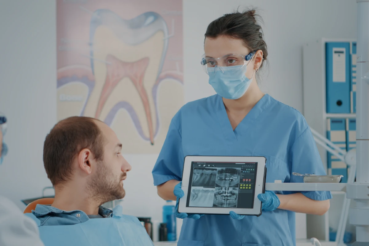 A practitioner giving a patient some results