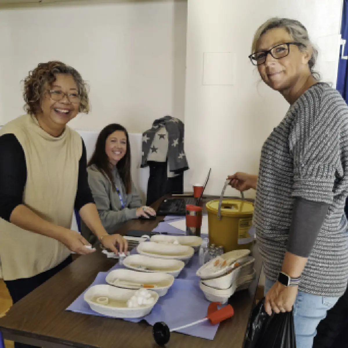 Staff helping with the clinics