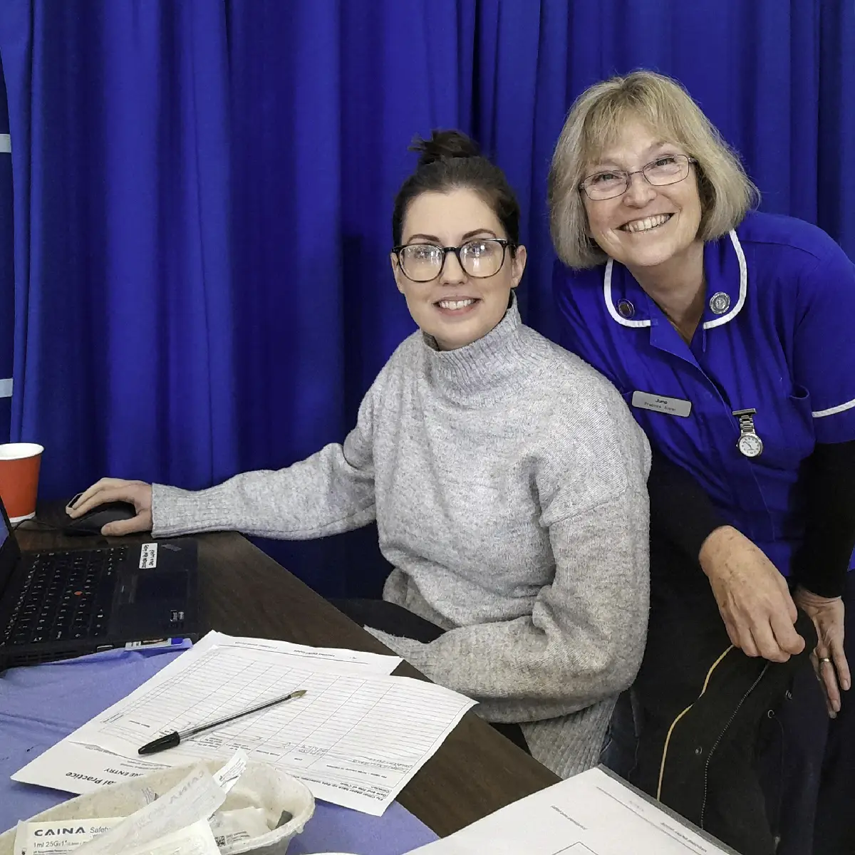 Staff helping with the clinics